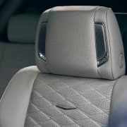 Close-Up of the Cadillac Crest on a 2025 Cadillac Escalade Seat 